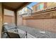 Small backyard patio with gravel and seating at 10176 Campo Tizzoro Ave, Las Vegas, NV 89147