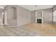 Living room with tile and laminate flooring, and a fireplace at 2155 Fountain Springs Dr, Henderson, NV 89074