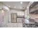 Kitchen with stainless steel appliances and white cabinets at 2360 Pickwick Dr, Henderson, NV 89014