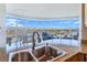 Granite kitchen island with double sink and city views at 322 Karen Ave # 1207, Las Vegas, NV 89109