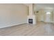 Living room boasts a fireplace and light neutral color palette at 3706 Rose Canyon Dr, North Las Vegas, NV 89032