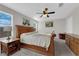 Main bedroom with walk-in closet and ceiling fan at 4529 Swimming Minnow Ave, Las Vegas, NV 89141