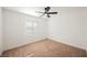 Simple bedroom with ceiling fan and neutral decor at 5420 Tinker Toy Ave, Las Vegas, NV 89139