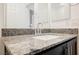 Bathroom with granite countertop and modern sink at 6411 Ranunculus St, North Las Vegas, NV 89084