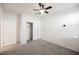 Spacious bedroom with closet and ceiling fan at 6411 Ranunculus St, North Las Vegas, NV 89084