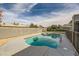 Sparkling pool with safety fence in a spacious backyard at 7312 Aragon St, Las Vegas, NV 89145