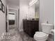 Modern bathroom with dark vanity and marble-look tile at 841 Santa Theresa Way, Mesquite, NV 89027