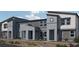 Modern townhouses with gray and blue exterior finishes at 9368 Serene Harbor St # Lot 30, Las Vegas, NV 89178