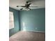 Bedroom with teal walls, ceiling fan, and carpeted floor at , North Las Vegas, NV 89081