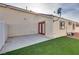 Small concrete patio and artificial turf area at 1016 Chestnut Bay Ave, North Las Vegas, NV 89031