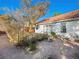 Backyard patio with seating area and bird bath at 1265 Del Lilly Ln, Las Vegas, NV 89123