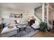 Living room with hardwood floors, comfortable seating, and a cozy atmosphere at 1607 Coal Valley Dr, Henderson, NV 89014