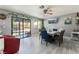 Bright dining room with a table for six and access to the backyard patio at 3170 Shadow Bluff Ave, Las Vegas, NV 89120