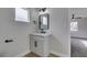 Modern bathroom with gray vanity and black fixtures at 341 Bedford Rd, Las Vegas, NV 89107