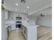 Modern kitchen featuring white cabinets, stainless steel appliances, and a large island at 341 Bedford Rd, Las Vegas, NV 89107