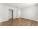 Bedroom with hardwood floors and mirrored closet doors at 3932 Lancome, Las Vegas, NV 89115