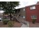 Exterior view of a two-story building with stairs and parking at 4730 E Craig Rd # 2094, Las Vegas, NV 89115