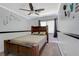 Bedroom with wood bed frame and decorative wall accents at 5902 Spinnaker Point Ave, Las Vegas, NV 89110