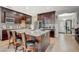 Kitchen island with granite countertop and stainless steel appliances at 5902 Spinnaker Point Ave, Las Vegas, NV 89110