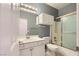 Clean bathroom with a shower/tub combo and vanity at 60 Vista Del Mar St, Henderson, NV 89012