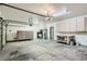 Large garage with storage cabinets and workbench at 60 Vista Del Mar St, Henderson, NV 89012