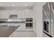 Modern kitchen with double oven and stainless steel fridge at 642 Steep Canyon Ave, Las Vegas, NV 89183