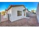 Private backyard with gravel landscaping and block wall at 7849 Montour Falls St, Las Vegas, NV 89149