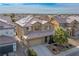 Two-story house with solar panels and landscaped yard at 817 E La Madre Way, North Las Vegas, NV 89081