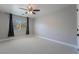 Bright bedroom with ceiling fan and neutral color palette at 9637 Lions Peak Ct, Las Vegas, NV 89139