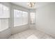 Bright dining area with tile floor and large windows at 1183 Winnipeg Ct, Henderson, NV 89002