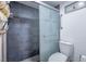 Clean bathroom with gray tile, walk-in shower, and updated fixtures at 1701 E Katie Ave # 72, Las Vegas, NV 89119