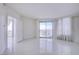 Bright and spacious living area with tiled floors and access to a balcony at 222 Karen Ave # 3907, Las Vegas, NV 89109