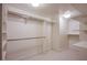 Spacious walk-in closet with custom shelving and hanging rods at 222 Karen Ave # 3907, Las Vegas, NV 89109