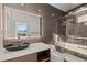 Elegant bathroom with glass shower and modern vanity at 2293 Buckingham Ct, Henderson, NV 89074