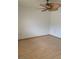 Bright bedroom with ceiling fan and laminate flooring at 2532 Big Timber Dr, Las Vegas, NV 89134