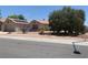 Single-story house with attached garage and mature trees at 2532 Big Timber Dr, Las Vegas, NV 89134