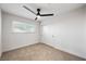 Well-lit bedroom featuring a ceiling fan and closet at 2900 Richfield Blvd, Las Vegas, NV 89102