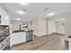 Modern kitchen with white cabinets, granite countertops, and stainless steel appliances at 5200 White Coyote Pl, Las Vegas, NV 89130