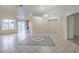 Spacious living room with tile floors and high ceilings at 5529 Cypress Creek St, North Las Vegas, NV 89031