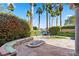 Landscaped backyard with firepit and seating area at 6 Via Mira Monte, Henderson, NV 89011