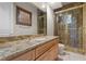 Bathroom with granite vanity and large shower at 6 Via Mira Monte, Henderson, NV 89011