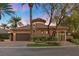 Elegant single-story home with circular driveway and landscaped yard at 6 Via Mira Monte, Henderson, NV 89011