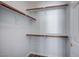 Spacious closet with wood shelving and hanging rods at 6754 Broadacres Ranch St, Las Vegas, NV 89148