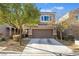 Two-story house with attached garage and landscaping at 6837 Dragonfly Rock St, Las Vegas, NV 89148