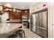 Modern kitchen with stainless steel appliances and granite countertops at 7232 Sierra Moon Ct, Las Vegas, NV 89118