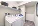 Convenient laundry room with Whirlpool washer and dryer at 7830 Pandora Sky St # 193, North Las Vegas, NV 89084