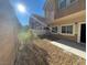 Small backyard with gravel and partial fencing at 8679 Tom Noon Ave # 102, Las Vegas, NV 89178