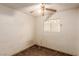 A small bedroom with a ceiling fan and window at 887 W Carey Ave, North Las Vegas, NV 89030