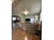 Living room with built-in shelving and hardwood floors at 9921 Canyon Peak Dr, Las Vegas, NV 89147