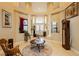 Grand entry with high ceilings, columns, and tile flooring at 9990 Four Views St, Las Vegas, NV 89143